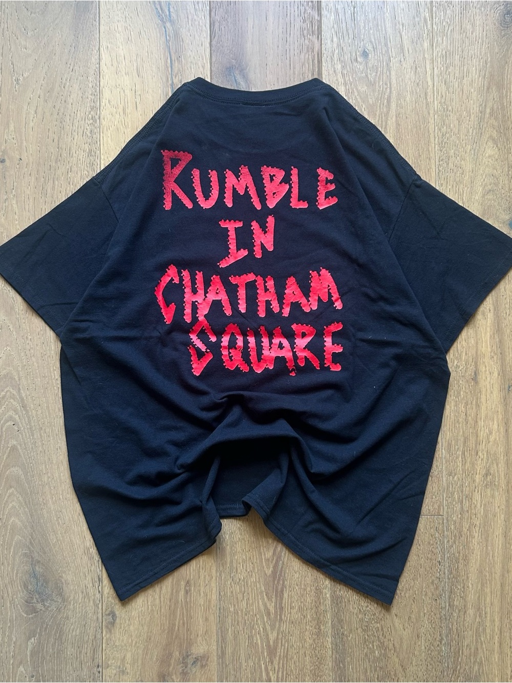 Onyx Collective Black Graphic Tee with Red 'Rumble in Chatham Square' Print